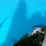 L'ombre de l'Aguglia di Goloritzè dans le bleu turquoise de la mer