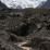 Traversée du glacier couvert qui descend directement du Pic Agasis (au fond)